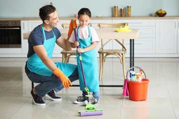 Sticker - Father and daughter cleaning kitchen together