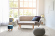 © Pixel-Shot - Interior of light room with comfortable sofa
