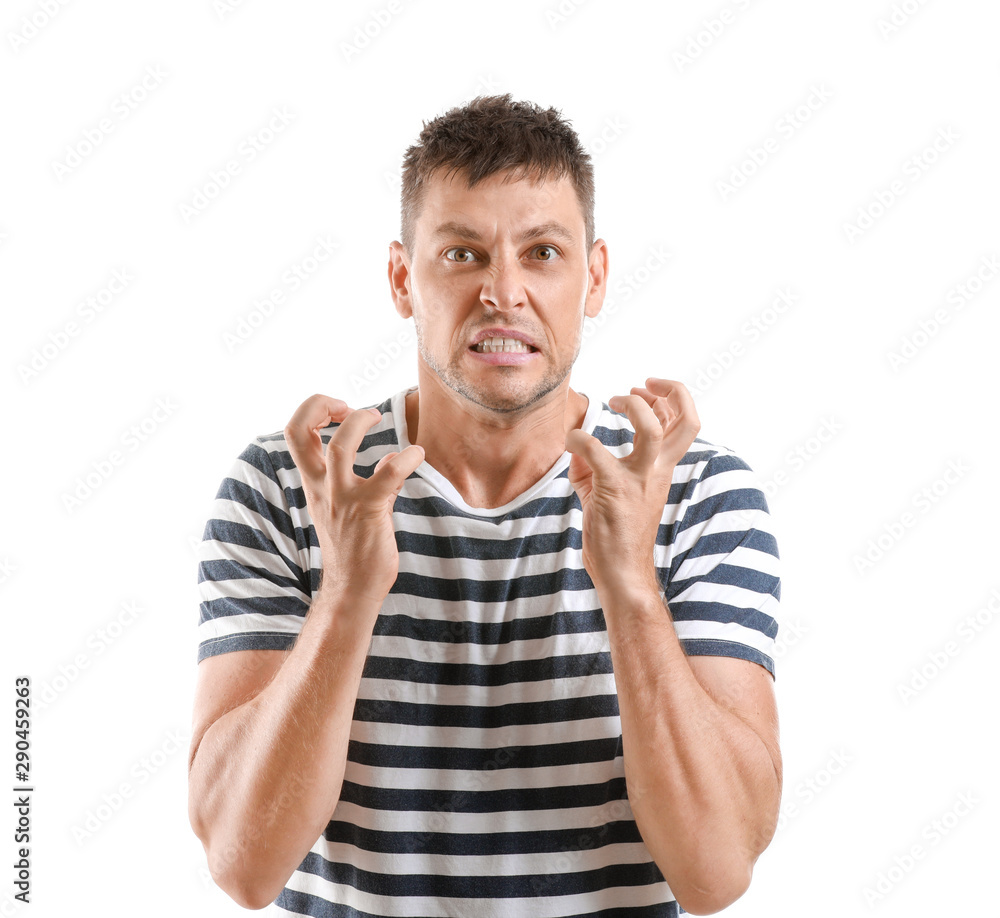 Portrait of angry man on white background