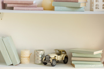 Wall Mural - The interior of the bedroom. Queen bed with bedspread. Breakfast table-tray with a cup, two croissants and a sprig of orchids on the bed.