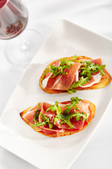 Canvas Print - Bruschetta with Parma Ham and Parmesan Cheese