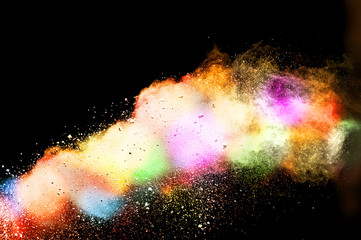 explosion of colored powder isolated on black background. abstract colored background. holi festival