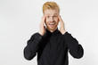 © ladyalex - Excited surprised shock young man isolated on gray background. Happy Redhead guy with red beard in black stylish shirt. Success and pass exam concept. Copy space. Close up of Face expression.