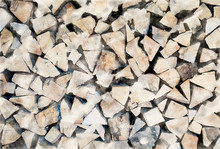 Stack Of Firewood Chopped Into Pieces