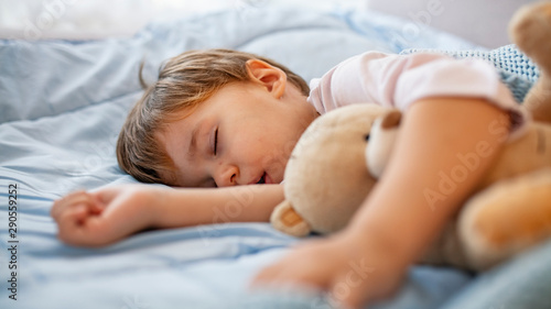 Cute Little Boy Sleeping In Bed At Home Sleeping Baby In Bed