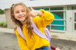 © Louis-Paul Photo - A nice Portrait of cute girl with backpack at school