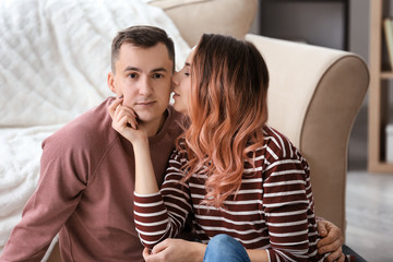 Poster - Cute young loving couple spending time at home