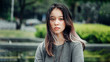 © Alex - Teen girl with neutral expression, outdoor portrait in park, Asian appearance