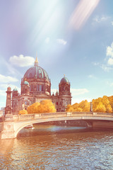 Fototapete -  Berlin Cathedral with a bridge over Spree river in Autumn