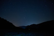 © German - Stars in the night sky overhead. Night starry sky over the mountains. Stars and constellations in the sky.