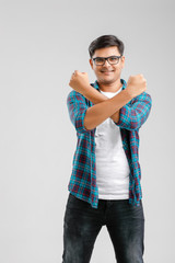 Sticker - Young Indian College boy  showing expression on white background 