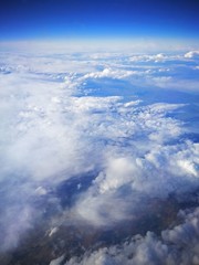 Wall Mural - cloud formations photographed from above from an airplane