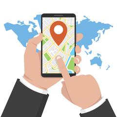 Wall Mural - hand holding phone with map and marker. mobile gps navigation and tracking concept. world map on bac
