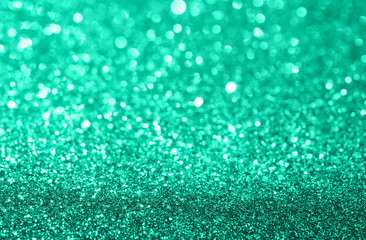 Wall Mural - Abstract composition. Trendy mint green glitter light background with beautiful bokeh