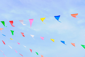 colorful flag festival celebrate with blue sky cloud background.