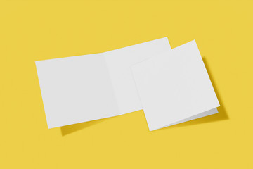 Two Mockup square booklet, brochure, invitation isolated on a yellow background with hard cover and realistic shadow. 3D rendering.