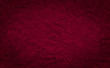 Closeup crumpled dark red color paper  texture backdrop. Burgundy ,Red paper sheet board with space for text ,pattern or abstract background.