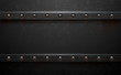 Dark metal background with rivets