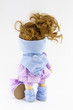 Handmade doll with natural hair. Isolated on a white background.