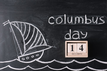 Sticker - wooden calendar with October 14 date on chalkboard with ship drawing and Columbus Day inscription