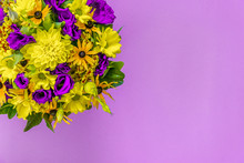 Close - Up Of Colorful Beautiful Spring Bouquet Isolated On Lilac Background. Bright Fresh Purple And Yellow Flowers. Decorative Composition Greeting Card For The Holiday On The Birthday. Copy Space