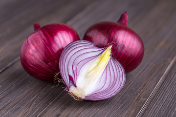 Wall Mural - red onions on rustic wood