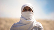 Bedouin in white clothes looking at camera, islamic religion and traditions