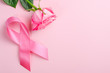 Pink ribbon and rose on a pink background. Breast Cancer Awareness Month