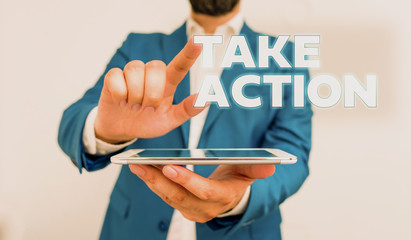 Wall Mural - Word writing text Take Action. Business photo showcasing advices someone to do something or reaction right now Businessman with pointing finger in front of him