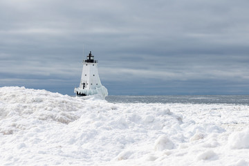 Wall Mural - lighthouse in snow