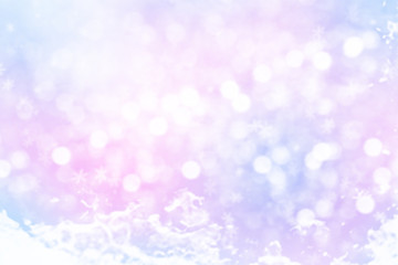 Wall Mural - Winter shiny snowflakes blurred background in light blue pink colors. Blurry Christmas holiday background with snow flakes, soft glares of light