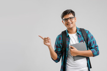 Wall Mural - Young indian man showing thump up