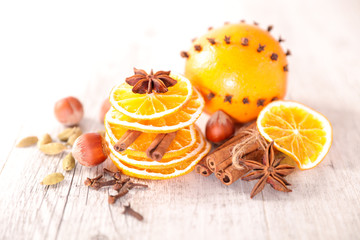 Wall Mural - dried orange and spices, christmas food ingredient