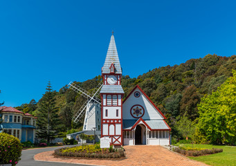 Poster - Wooden Church in Founders Park, New Zealand. Copy space for text.