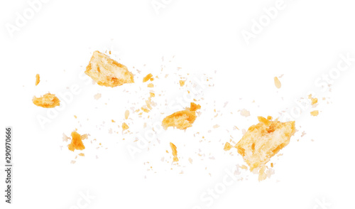 Cuadros en Lienzo Scattered crumbs isolated on white background