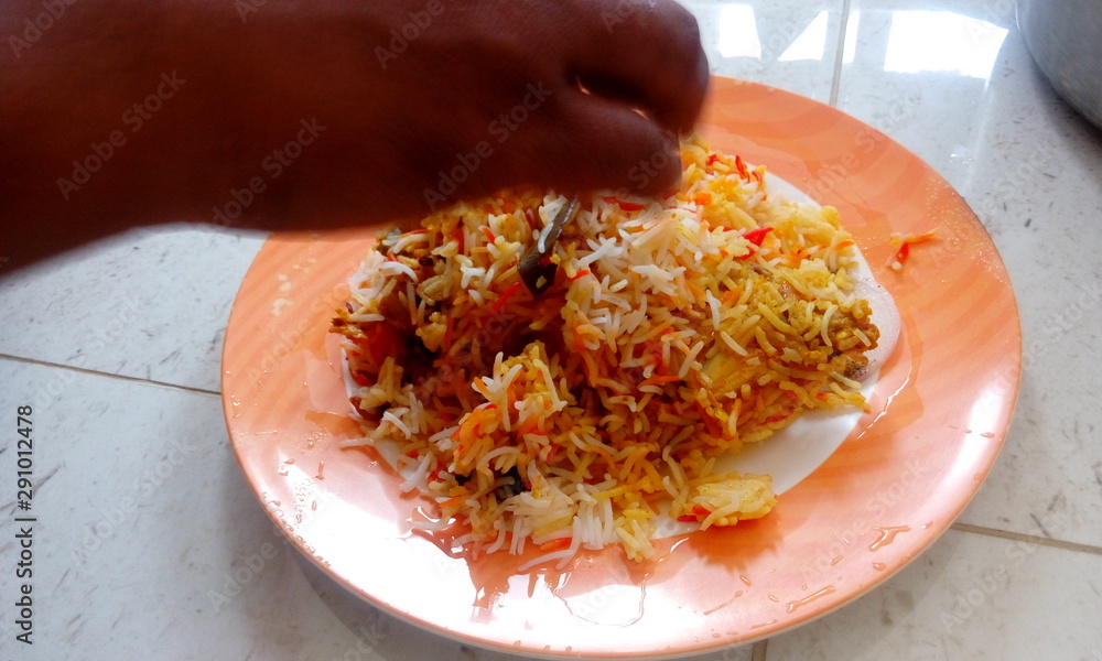 Hyderabad Chicken Spicy fried rice is ready to serve and decorations by ...