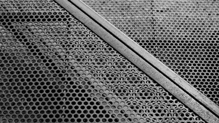 Poster - circle steel grating at construction area.