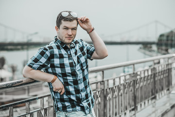 Young guy at city street, concept of modern people, citizen lifestyle 