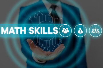 Text sign showing Math Skills. Business photo showcasing starting to learn how to count numbers add divide use equation Male human wear formal work suit presenting presentation using smart device
