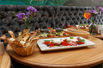 Wall Mural - Caprese salad and set of finger food