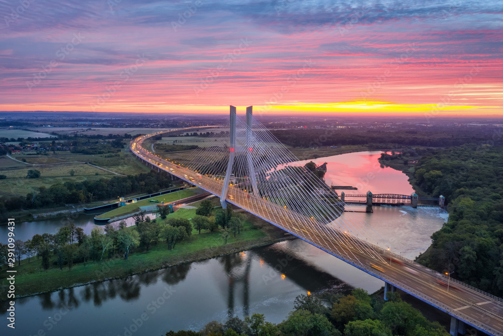 Obraz na płótnie Aerial view of Most Redzinski bridge over Oder river on sunrise in Wroclaw, Poland w salonie