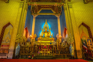 The golden Phra Buddha Chinnarat in chapel. Wat Benjamabopit The Marble Temple (Wat Benchamabophit)is one of the most significant temples in Bangkok  for it's the combination of profound beauty and re