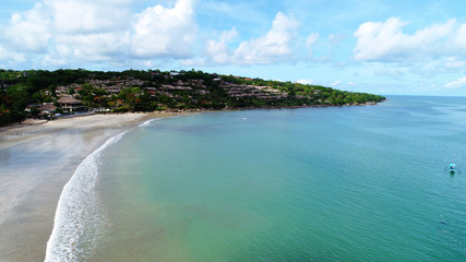 beach and sea, drone view of a resorts at jimbaran beach, bali.