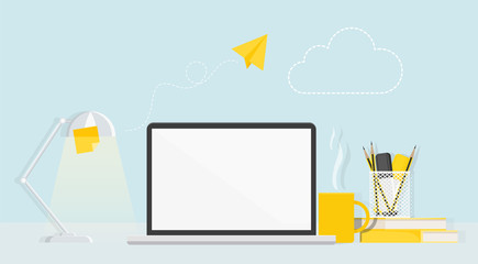 Desktop with computer, lamp, stationery and flying paper airplane.