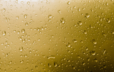 Wall Mural - Gold drops abstract background, metallic color