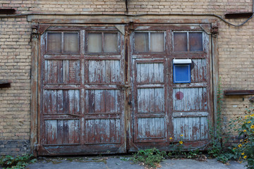 Wall Mural - Old vintage wall with worn wooden door