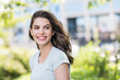 © kite_rin - Beautiful happy young woman closeup portrait. Pretty model girl with perfect fresh clean skin smiling  outdoors.