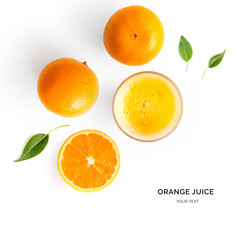 Wall Mural - Creative layout made of orange juice. Flat lay. Food concept. Orange on the white background.