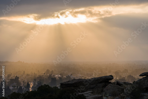 Sun bursting through low cl...