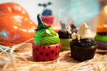 Extreme Closeup Of Halloween Cupcakes , Witch Hat Theme Cupcake Next To Ghost 